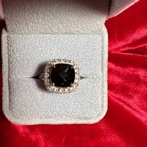 Costume Ring- black onyx-type stone with glass stones. Size 7. No tarnish.